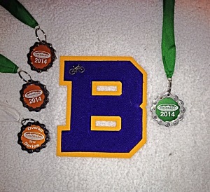 Cassie's letter and medals for the 2014 season