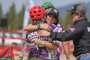 Happy coach to rider embrace post race, Cheri will be missed!